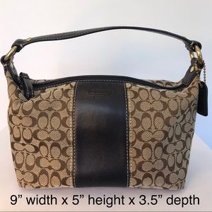 Classic tan and black Coach top handle purse.